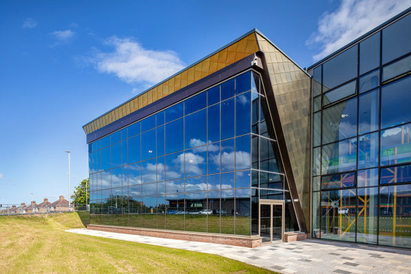 Exterior photo of building showing curtain wall facade